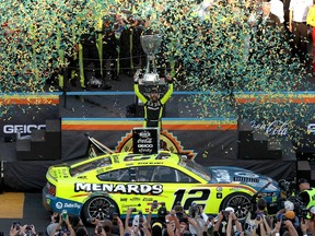 Ryan Blaney celebrates in victory lane after winning the 2023 NASCAR Cup Series Championship at Phoenix Raceway on November 5, 2023 in Avondale, Arizona.