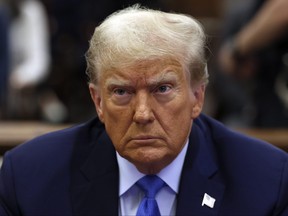 Former president Donald Trump waits to take the witness stand during his civil fraud trial at New York Supreme Court, Monday, Nov. 6, 2023, in New York.