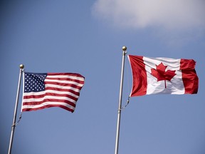 The Canadian flag and the American flag