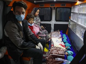 Palestinian premature babies, evacuated from Gaza City's Al Shifa hospital, are transported in a Palestinian Red Crescent ambulance through the Rafah crossing in the southern Gaza Strip to Egypt, on November 20, 2023.