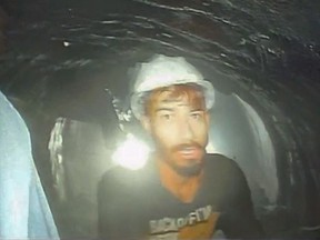 This screen grab image provided by the Uttarakhand State Disaster Response Force (SDRF) shows one of the 40 workers trapped inside a collapsed tunnel in Silkyara, in the northern Indian Uttarakhand state, India, Tuesday, Nov. 21, 2023.