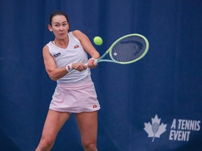 Canada's Stacey Fung plays Switzerland's Lulu Sun during the Calgary National Bank Challenger tennis tournament on Friday