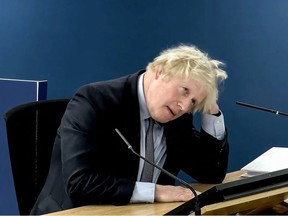 A video grab from footage broadcast by the UK Covid-19 Inquiry shows Britain's former Prime Minister Boris Johnson speaking at the UK Covid-19 Inquiry, in west London, on December 6, 2023 to give evidence.