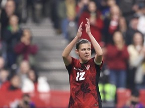Christine Sinclair of Canada acknowledges fans as she leaves the field during the second half against Australia at BC Place on December 05, 2023 in Vancouver, British Columbia.
