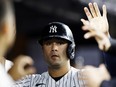 Isiah Kiner-Falefa of the New York Yankees celebrates in the dugout during the game against the Toronto Blue Jays at Yankee Stadium on September 21, 2023 in the Bronx borough of New York City.