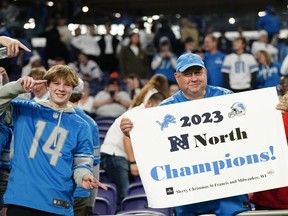 Fans celebrate after a game between the Minnesota Vikings and the Detroit Lions, Sunday, Dec. 24, 2023, in Minneapolis.
