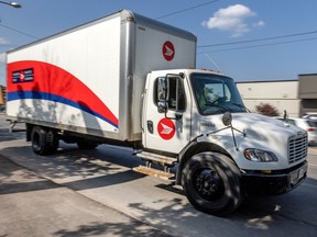 This file image shows a Canada Post delivery truck.