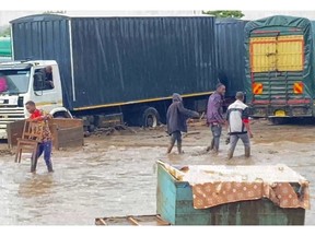 In this frame grab from video, flooded streets are seen in the town of Katesh, in Tanzania, Sunday, Dec 3, 2023.