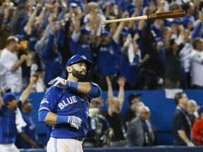 Blue Jays' Jose Bautista tosses his bat after hitting a crucial home run against the Texas Rangers in 2015.