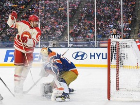 Nazem Kadri #91 of the Calgary Flames scores against Stuart Skinner #74 of the Edmonton Oilers during the first period of the 2023 Tim Hortons NHL Heritage Classic at Commonwealth Stadium on October 29, 2023 in Edmonton, Alberta, Canada.