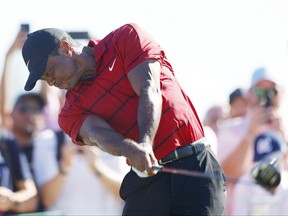 Tiger Woods of the United States plays his shot from the 15th tee during the final round of the Hero World Challenge at Albany Golf Course on December 3, 2023 in Nassau, Bahamas.