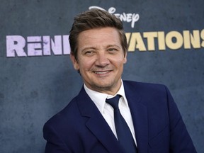 Jeremy Renner, the host and executive producer of "Rennervations," poses at the premiere of the four-part Disney+ docuseries, Tuesday, April 11, 2023, at the Westwood Regency Village Theatre in Los Angeles.