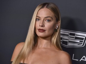 Margot Robbie arrives at Variety's Power of Women on Thursday, Nov. 16, 2023, at Mother Wolf in Los Angeles.