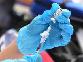 The Pfizer Covid-19 vaccine is prepared for administration at a vaccination clinic for homeless people, hosted by the Los Angeles County Department of Public Health and United Way on September 22, 2021 in Los Angeles, California. The United States on September 11, 2023.