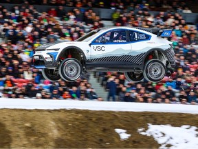Driver Conner Martell flies over a jump during Nitrocross racing at Stampede Park on Feb. 5, 2023.
