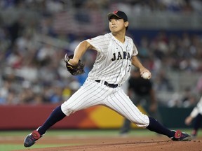 Japanese pitcher Shota Imanaga throws during the World Baseball Classic championship game against the United States, Tuesday, March 21, 2023, in Miami.