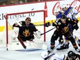 Calgary Flames goalie Jacob Markstrom is scored on by St. Louis Blues foward Brandon Saad in second-period action at the Scotiabank Saddledome in Calgary on Tuesday, Jan. 23, 2024. Saad also scored the game-winner with 48 seconds left in regulation.