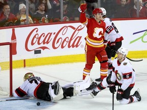 Calgary Flames forward Yegor Sharangovich scores on Ottawa Senators goalie Joonas Korpisalo at the Scotiabank Saddledome in Calgary on Jan. 9, 2024.