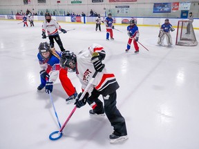 The Cal BV Blizzardz (blue) and the Cal NW Killer Whales compete in their U12C game in the Esso Golden Ring ringette tournament at the Henry Viney arena on Friday, January 19, 2024. The Killer Whales won the game 7-2.