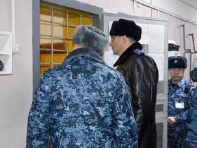 In this photo released by The Russian Federal Penitentiary Service (FPS) on Friday, Dec. 15, 2023, a group of officers visit a prison colony in the town of Kharp, in the Yamalo-Nenetsk region about 1,900 kilometres northeast of Moscow.