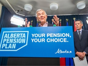 Jim Dinning, chair, Alberta Pension Plan Engagement Panel gives an update on the Alberta Pension Plan engagement as Nate Horner, President of Treasury Board and Minister of Finance listens on Friday, Dec. 8, 2023 in Edmonton.