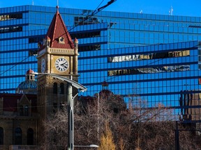 Calgary's Historic City Hall is framed against the newer Municipal Building