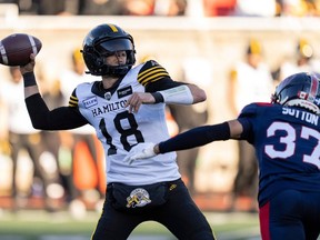 Hamilton Tiger-Cats quarterback Matthew Shiltz throws under pressure from Montreal Alouettes defensive back Wesley Sutton during the CFL Eastern Semifinal at Percival Molson Memorial Stadium in Montreal on Nov. 4, 2023.