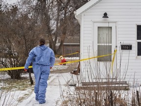 Forensic investigators on the scene of an ongoing investigation regarding five deaths in southern Manitoba, in Carman, Man., Monday, Feb. 12, 2024. THE CANADIAN PRESS/David Lipnowski