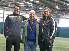 (L-R) Jonathan "Jay" Wheeldon, Tommy Wheeldon Sr and Tommy Wheeldon Jr pose at the Macron Performance Centre in Calgary following Cavalry FC practice on Monday, April 4, 2022. Jay Wheeldon joins Cavalry FC's coaching staff in assistant's role of Canadian Premier League club. Jim Wells/Postmedia