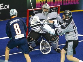 Calgary Roughnecks goaltender Christian Del Bianco makes a save against New York Riptide on WestJet Field at Scotiabank Saddledome in Calgary on Friday, February 2, 2024.