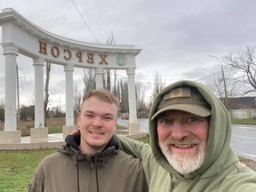 Calgary humanitarian aid workers Mac Hughes, (L) and his father Paul on the outskirts of Kherson, Ukraine on March 18, 2024. Photo supplied by Paul Hughes