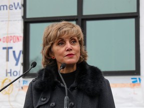 Calgary Mayor Jyoti Gondek speaks outside the under-construction affordable housing project Hope Heights on 12th Avenue N.W. in Crescent Heights on Tuesday March 26, 2024.