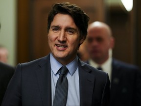 Prime Minister Justin Trudeau leaves caucus on Parliament Hill in Ottawa on Wednesday, March 20, 2024.