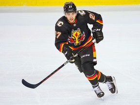 Calgary Flames forward Matt Coronato skates during NHL action against the New Jersey Devils in Calgary on Saturday, December 9, 2023.