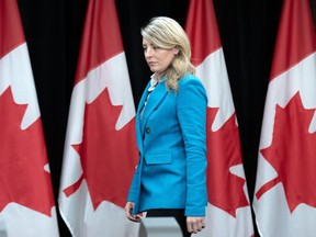 Minister of Foreign Affairs Melanie Joly arrives for a news conference reporters about the situation in Haiti, Monday, March 25, 2024 in Ottawa.