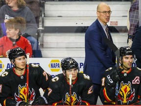 Calgary Flames head coach Ryan Huska is photographed on the bench during NHL action against the Colorado Avalanche at the Scotiabank Saddledome on Tuesday, March 12, 2024. Colorado won 6-2.