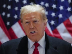 Former U.S. President Donald Trump speaks during a press conference at 40 Wall Street after a pre-trial hearing at Manhattan criminal court, Monday, March 25, 2024, in New York. A New York judge has scheduled an April 15 trial date in former President Donald Trump's hush money case. Judge Juan M. Merchan made the ruling Monday.