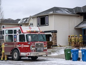 Calgary Fire Department and Calgary police at the aftermath of a fatal fire that took place at a home on Douglas Ridge Green S.E. on Friday, February 18, 2022.