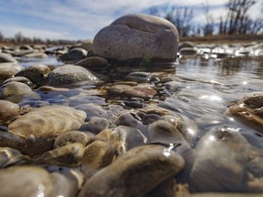 Cobblestones waiting for spring runoff in the Oldman River at Ft. Macleod, Ab., on Monday, April 15, 2024.