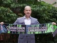 Mark Noonan, CEO of Canadian Soccer Business and commissioner of the Canadian Premier League, holds a CPL scarf in an undated handout photo.