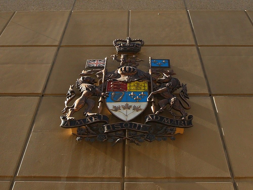 Exterior signage is shown at the Calgary Courts Centre in downtown Calgary on Monday, March 11, 2024.