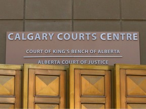 Exterior signage is shown at the Calgary Courts Centre in downtown Calgary on March 11, 2024.
