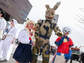 Cosplay fans hang outside Calgary Expo at Stampede Park on Saturday, April 27, 2024.