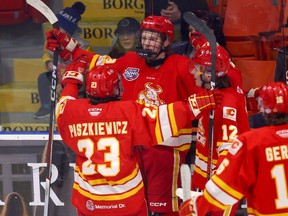 The Calgary Canucks celebrate a goal by defenceman Easton Hewson against the Whitecourt Wolverines during Game 3 of the Inter Pipeline Cup at Max Bell Centre in Calgary on Tuesday, April 16, 2024.
