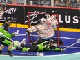 Calgary Roughnecks goaltender Christian Del Bianco defends the net as the ball sails over the net during a game against the Saskatchewan Rush on WestJet Field at Scotiabank Saddledome on Friday, April 5, 2024.
