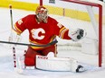 Calgary Flames goalie Jacob Markstrom battles a Los Angeles Kings shot at the Scotiabank Saddledome in Calgary on Tuesday, February 27, 2024.