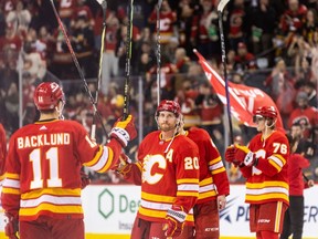 The Calgary Flames salute the fans as their season concludes at the Scotiabank Saddledome in Calgary on Thursday, April 18, 2024.