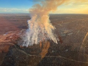 An out-of-control wildfire, dubbed Wildfire MWF012, is seen burning west of Saprae Creek on April 21, 2024.