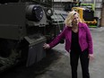 FILE - Secretary of the Army Christine Wormuth looks over the latest version of the M1A2 Abrams main battle tank as she tours the Joint Systems Manufacturing Center, Feb. 16, 2023, in Lima, Ohio. Two U.S. officials say Ukraine has sidelined U.S.-provided Abrams M1A1 battle tanks for now in its fight against Russia. This is in part because Russian drone warfare has made it too difficult for them to operate without detection or coming under attack.