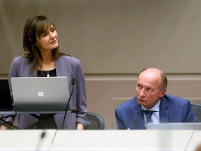 Sonya Sharp and Andre Chabot as Calgary city council began their budget deliberations in Calgary on Monday, November 20, 2023.